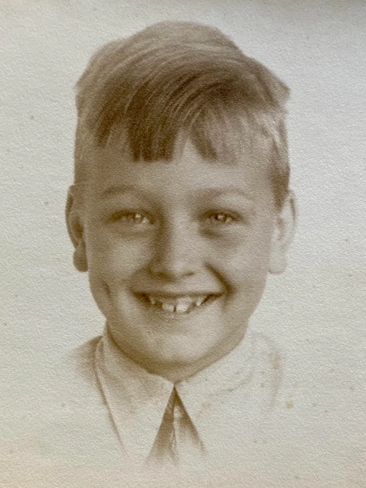 Photo of my Dad as a young boy, smiling